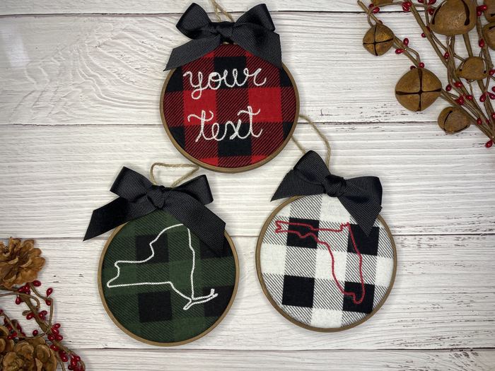 Buffalo plaid hoop ornaments embroidered with state outlines and custom text