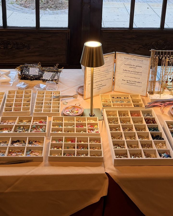The Hoop & Hand charm bar set up at a restaurant event
